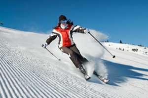 photo of skier on slope